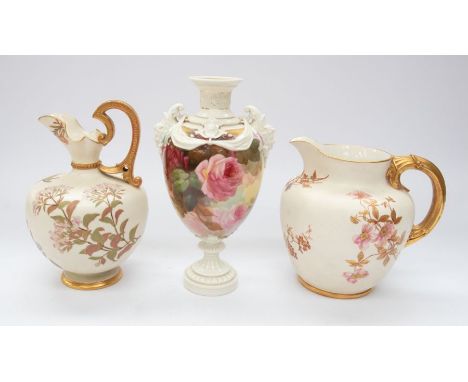 Two early 20th century Royal Worcester Blush Ivory china jugs with foliage and gilt detail, together with a Worcester porcela