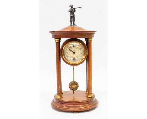 An early 20th century, mahogany, 8-day mantel clock with Arabic numerals and hunter detail to the top