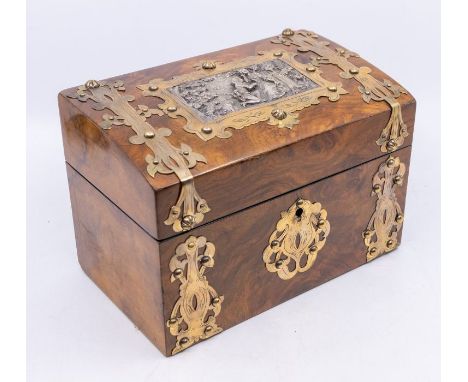 A 19th Century brass bound walnut veneered casket tea caddy, the cover inset with white metal plaque depicting 18th Century l