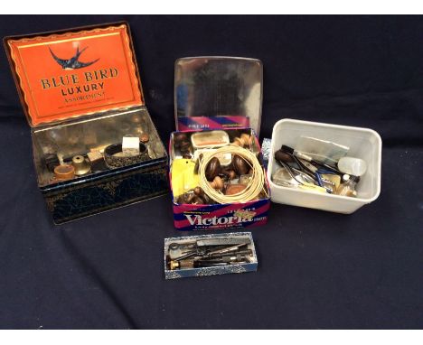 A collection of watchmaker's tools and bits