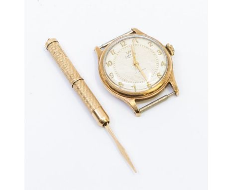 A 9ct gold tooth pick, engine turned case, length approx 50mm weight approx 6.4gms (small gouge to one end) along with a gent