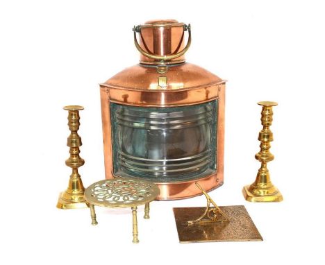 A collection of brass and copper wares, to include: portside ship's lamp, miners lamps, kettles, candlesticks etc