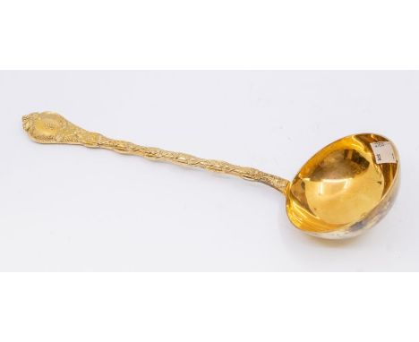 An early 20th Century French silver-gilt Demidoff style pattern soup ladle, hallmarked by Odiot, 950 standard (Minerva mark),