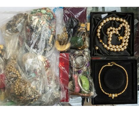 A large collection of costume jewellery to include Monet jewellery, various paste set jewellery including, brooches, pendants