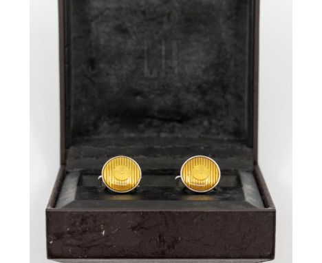 Dunhill- a pair of silver Dunhill orange 'headlamp' cufflinks, size approx 14mm, swivel fittings in original Dunhill presenta