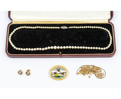A cultured pearl necklace comprising graduated pearls, on a 9ct white gold ruby and pearl set clasp, length approx 90cm, case