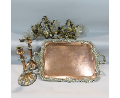 A copper tray with silver plated grape vine edging and a pair of candlesticks similar, together with sections of brass ceilin