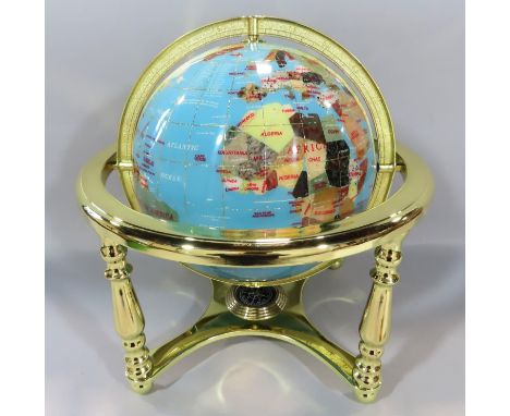 An Osborne &amp; Allen Ltd Lapis World Globe, the countries picked out in different minerals, on a brass effect axis, incorpo