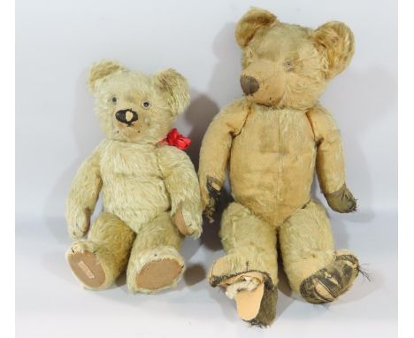 A Hygienic Toy Mohair Teddy Bear made by Chad Valley sporting a red ribbon, together with another worn and torn vintage Teddy
