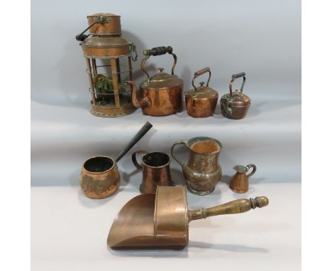 A mixed selection of vintage copper, including a lantern, kettles, grain scoop, pitcher, measure etc