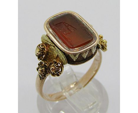 19th century yellow metal carnelian seal ring, with intaglio-cut motto 'Prenez Garde' (Take Care) above a rat approaching a t