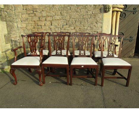 A fine quality set of six Chippendale style mahogany dining chairs with carved gothic tracery backs and a pair of similar car