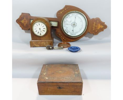 An Edwardian inlaid barometer, a walnut domed mantel clock, walnut box, two ashtrays, tiny tortoise shell mandolin