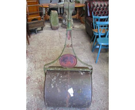 An Edwardian cast iron garden roller with decorative finish 'The Mac' 57cm wide 