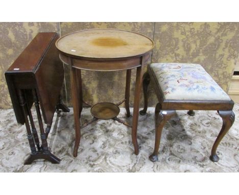 An Edwardian mahogany drop-leaf Sutherland type tea table raised on slender turned and splayed moulded supports, together wit