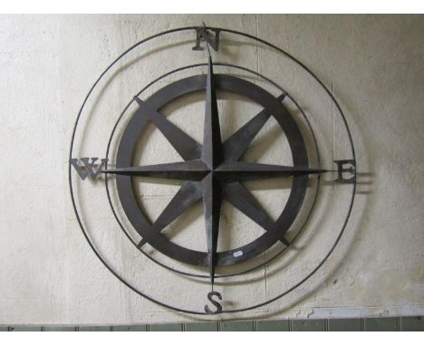 A contemporary decorative light copper circular wall plaque, approx 80 cm diameter