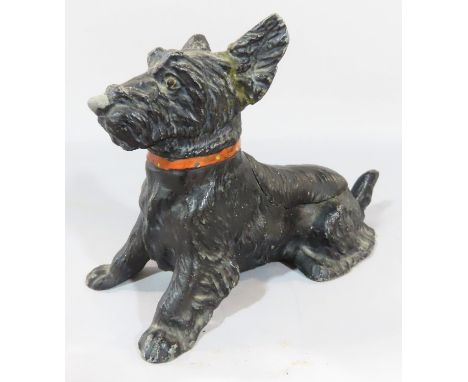 A 20th century Austrian cold painted bronze Black Scottie Dog ashtray, with hinged back with waste trap below, Made in Austri