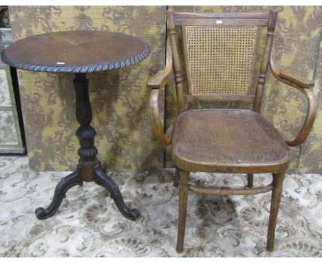 A Victorian oak occasional table, the circular top with gadroon border raised on a turned pillar and tripod, 75 cm high x 57 