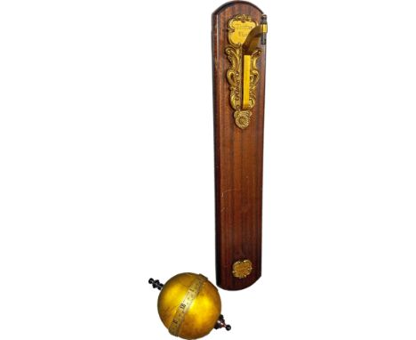 A Thwaites &amp; Reed mahogany and brass hanging ball clock, the circular sphere with silvered band mounted on mahogany plint