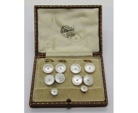 Early 20th century 18ct mother-of-pearl and white enamel dress jewellery set, comprising pair of cufflinks, four buttons and 