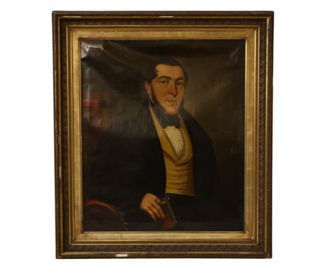 British School, 19th Century - A portrait of a gentleman holding a book, half-length, 76 x 65 cm, in gilt frame of the period