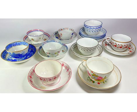 An interesting collection of early 19th century Newhall teacups and saucers, tea bowls, etc, various patterns (approx 24 styl