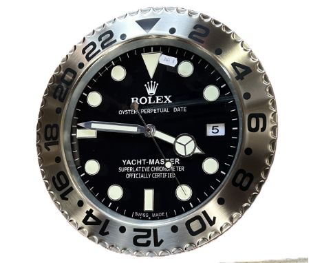 A contemporary decorative ‘Rolex dealer display’ wall clock, marked ‘Rolex, Oyster Perpetual Date, Yacht-Master’ to the black