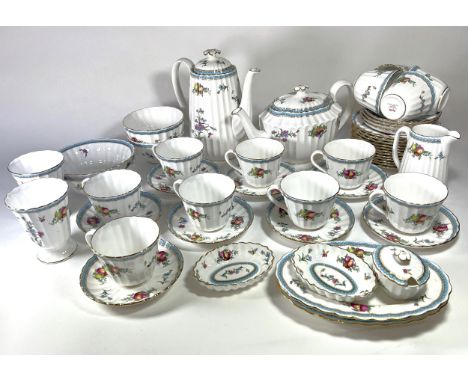 A large Spode porcelain dinner service in ‘Trapnell Sprays’ pattern, to accommodate twelve place settings.