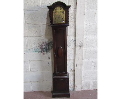 An Edwardian grandmother clock with broken arch dial and three train striking movement, the engraved brass dial with ‘Tempus 
