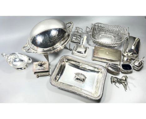 A large collection of quality silver plate to include toast rack, butter dish, warming plates, flatware etc