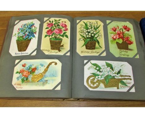 Four large and one small Victorian / early 20th century postcard albums with contemporary contents together with two empty ex