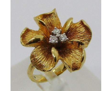 Vintage 18ct naturalistic floral dress ring set with three diamonds, 0.15ct each approx,  maker 'R&amp;G', London 1973 import