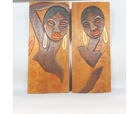 Two African carved wood portrait panels 74cm x 32cm 