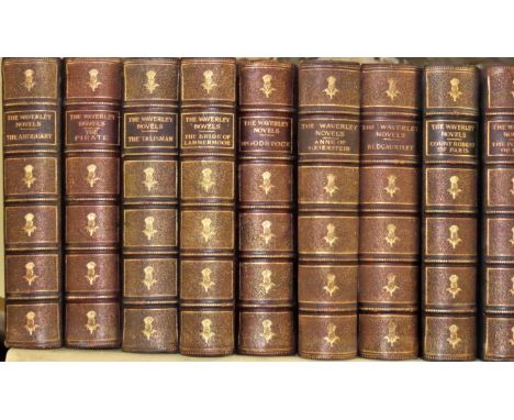 A complete set of 27 of Scott's Waverley novels (120cm shelf span) teal cloth and black trim bindings, published by Merrill a
