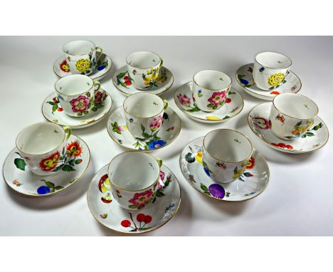 A collection of 10 Herend fruit and floral patterned teacups and saucers 