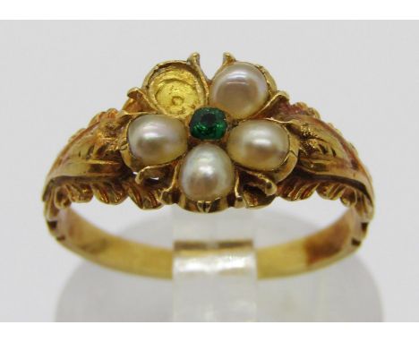 19th century yellow metal mourning ring set with a floral cluster of pearls and small emerald to centre, with woven hair to i