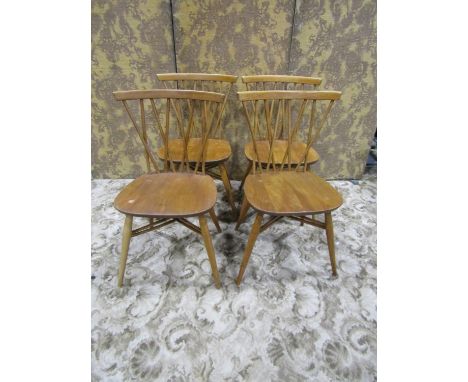 Set of four Ercol candlestick chairs 