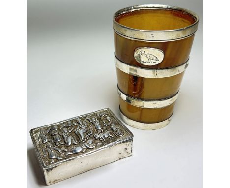 A middle eastern silver cards tin with embossed figures, 7cmx4.5cm and a horn beaker with silver metal banding (2)