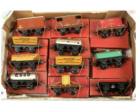 Hornby O Gauge post-war group of Goods Wagons consisting of BR Brake Van, NE Goods Van, Side Tipping Wagon, Rotary Tipping Wa