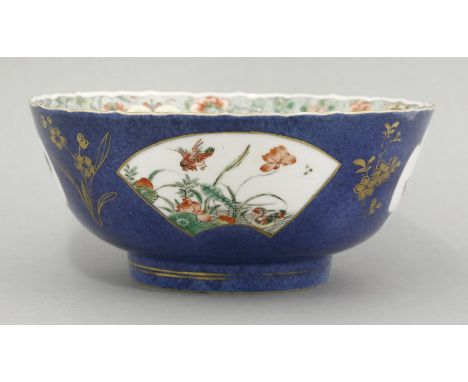 A famille verte powder blue Bowl, Kangxi (1662-1722), the exterior with birds and flowers in lobed and fan-shaped panels agai