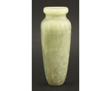 A jade Wall Vase,19th century, engraved with diaper and carved with a low relief archaic xi between false gadroons, the shoul