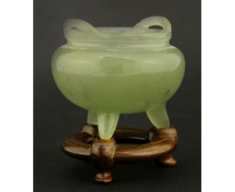 A jade tripod Censer,second half of the 19th century, the moss-green stone with twin loop handles and stub feet, 8cm, wood st