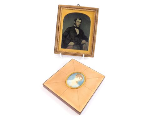 A Victorian daguerreotype portrait of a gentleman, seated at a table, in a gilt and red leather frame, 14.5cm x 11.5cm, toget