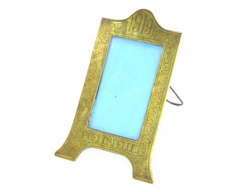 A World War I Trench Art easel strut photograph frame, commemorating Poelcapelle, dated 1919, with additional floral stipple 