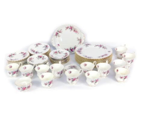 A Royal Albert Lavender Rose pattern tea and dinner service, comprising ten dinner plates, cake plate, fourteen teacups, seve