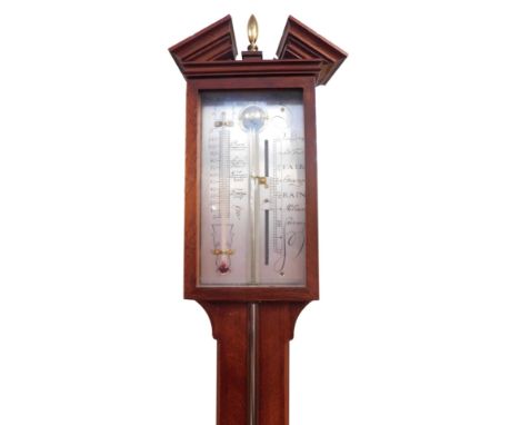 A modern mahogany cased stick barometer, with a silvered dial, 94cm high. 