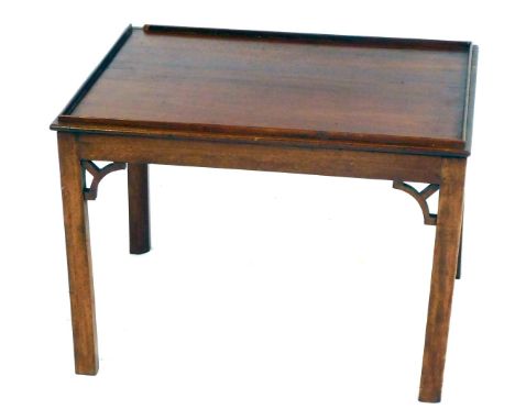 A Chippendale style mahogany side table, on chamfered square legs, 40cm high, 57cm wide, 43cm deep.