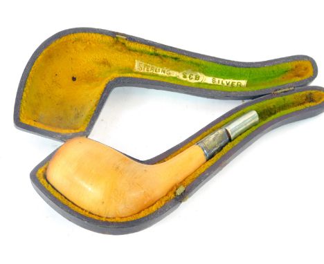 A cased meerschaum pipe, with turned wooden bowl, on white metal cap end, stamped sterling. (AF)