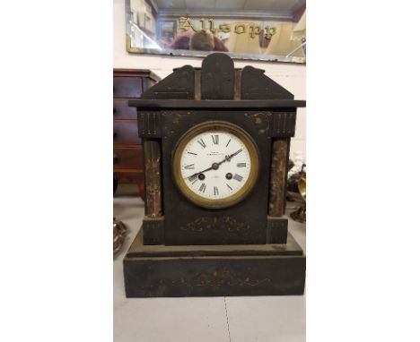 A late Victorian black slate two hole mantel clock by Mappin and Webb