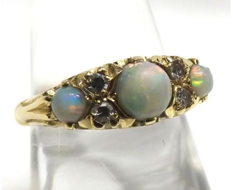 18ct Gold half hoop ring set with three Opals and four small Diamonds, approx 4,9gms gross, size M  